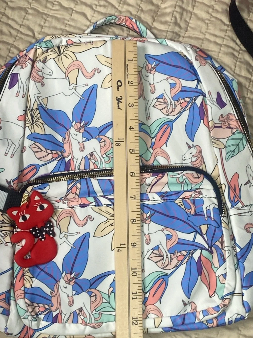 three backpacks of different sizes